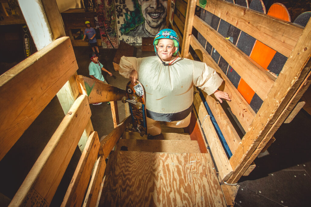 youth skateboarder dressed up as a sumo wrestler