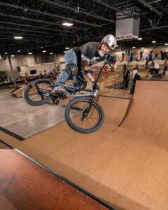 A BMX rider airs out of the vert ramp at GBASO